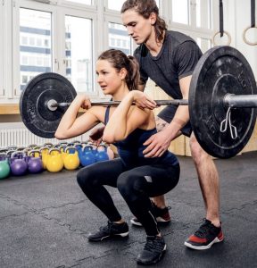 squat con bilanciere